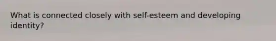 What is connected closely with self-esteem and developing identity?