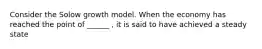 Consider the Solow growth model. When the economy has reached the point of ______ , it is said to have achieved a steady state