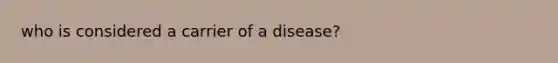 who is considered a carrier of a disease?