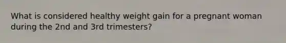 What is considered healthy weight gain for a pregnant woman during the 2nd and 3rd trimesters?