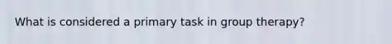 What is considered a primary task in group therapy?