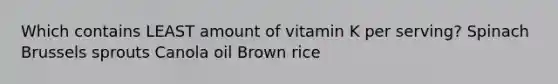 Which contains LEAST amount of vitamin K per serving? Spinach Brussels sprouts Canola oil Brown rice