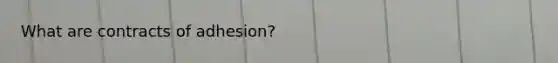 What are contracts of adhesion?