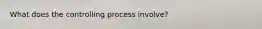 What does the controlling process involve?