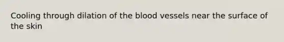 Cooling through dilation of the blood vessels near the surface of the skin