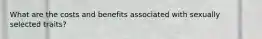 What are the costs and benefits associated with sexually selected traits?