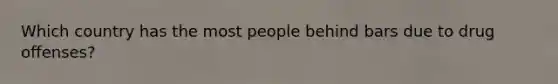 Which country has the most people behind bars due to drug offenses?