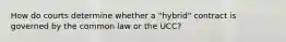 How do courts determine whether a "hybrid" contract is governed by the common law or the UCC?