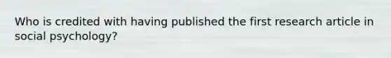 Who is credited with having published the first research article in social psychology?