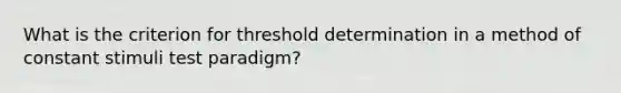 What is the criterion for threshold determination in a method of constant stimuli test paradigm?