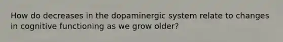 How do decreases in the dopaminergic system relate to changes in cognitive functioning as we grow older?