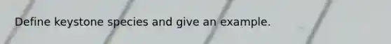 Define keystone species and give an example.