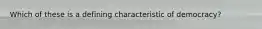 Which of these is a defining characteristic of democracy?