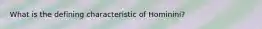 What is the defining characteristic of Hominini?