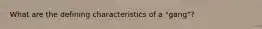 What are the defining characteristics of a "gang"?