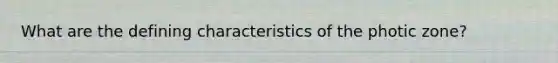 What are the defining characteristics of the photic zone?