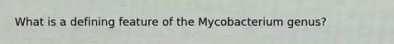 What is a defining feature of the Mycobacterium genus?