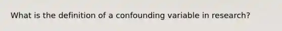 What is the definition of a confounding variable in research?