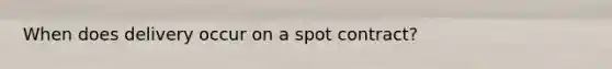 When does delivery occur on a spot contract?