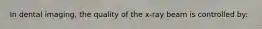 In dental imaging, the quality of the x-ray beam is controlled by: