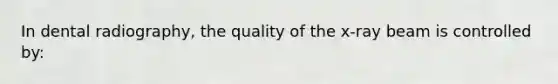 In dental radiography, the quality of the x-ray beam is controlled by: