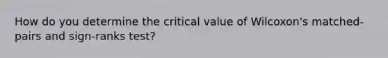 How do you determine the critical value of Wilcoxon's matched-pairs and sign-ranks test?