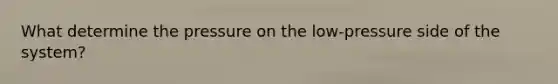 What determine the pressure on the low-pressure side of the system?
