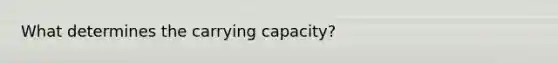 What determines the carrying capacity?