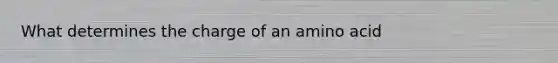 What determines the charge of an amino acid