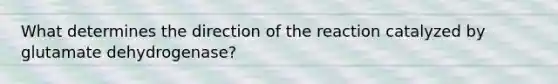 What determines the direction of the reaction catalyzed by glutamate dehydrogenase?