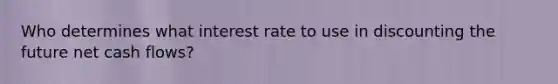 Who determines what interest rate to use in discounting the future net cash flows?