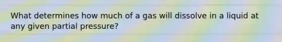 What determines how much of a gas will dissolve in a liquid at any given partial pressure?