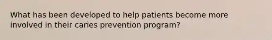 What has been developed to help patients become more involved in their caries prevention program?