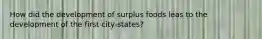 How did the development of surplus foods leas to the development of the first city-states?