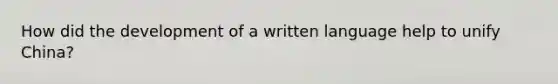 How did the development of a written language help to unify China?
