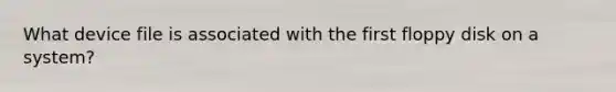 What device file is associated with the first floppy disk on a system?