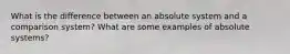 What is the difference between an absolute system and a comparison system? What are some examples of absolute systems?