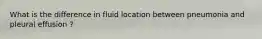 What is the difference in fluid location between pneumonia and pleural effusion ?