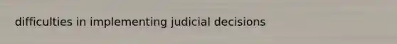 difficulties in implementing judicial decisions