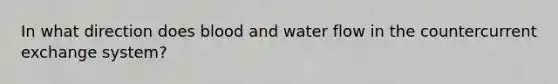 In what direction does blood and water flow in the countercurrent exchange system?