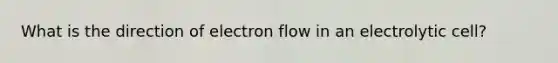 What is the direction of electron flow in an electrolytic cell?