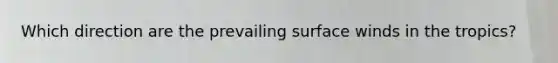 Which direction are the prevailing surface winds in the tropics?