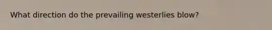What direction do the prevailing westerlies blow?