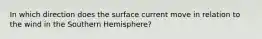 In which direction does the surface current move in relation to the wind in the Southern Hemisphere?