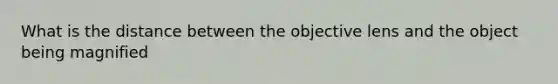 What is the distance between the objective lens and the object being magnified