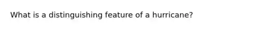 What is a distinguishing feature of a hurricane?