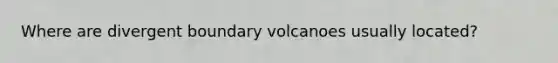 Where are divergent boundary volcanoes usually located?