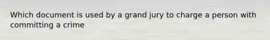 Which document is used by a grand jury to charge a person with committing a crime