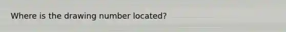 Where is the drawing number located?