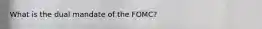 What is the dual mandate of the FOMC?